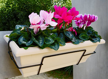 Balcony flower pot with metal support included to hang it from a railing